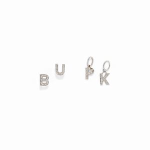 A 18K white gold and diamond lot of two earrings and two pendants