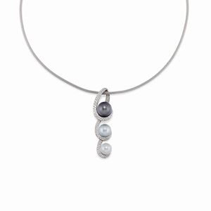 A 18K white gold, cultured pearl and diamond necklace