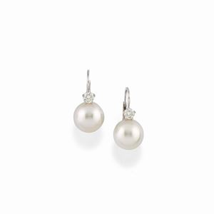 A 18K white gold, cultured pearl and diamond earrings