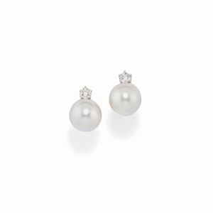 A 18K white gold, cultured pearl and diamond earrings