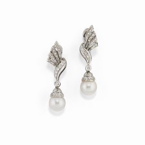 A 18K white gold, cultured pearl and diamond earrings