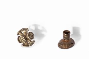 Two seals, one in iron with noble coat of arms and motto, and a multiple one in white metal with eight faces, England 18th - 19th centuries