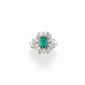 A 18K white gold, emerald and diamond ring, circa 1960