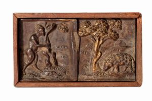 Antique wooden bas-relief depicting satyr and sheep within landscape