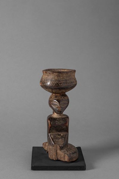 LUBA, Figura Janus in legno duro