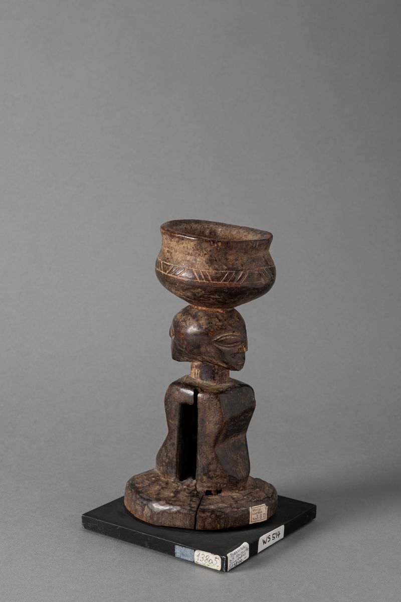 LUBA, Figura Janus in legno duro