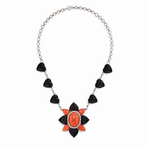 A 18K white gold, coral, onyx and diamond necklace