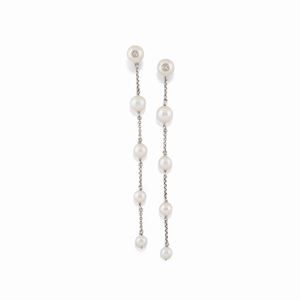 A platinum, 18K white gold, cultured pearl and diamond earrings