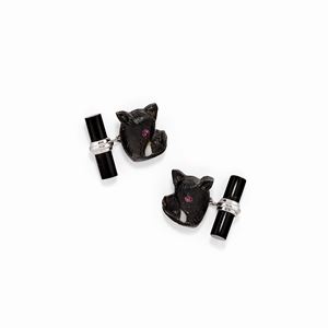 A 18K white gold and onyx cufflinks