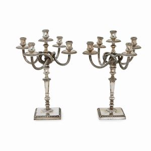 Two silver candelabra