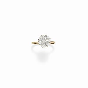 A 18K white gold and solitaire diamond ring, with certificate