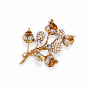 A 18K white and yellow gold, diamond and cultured pearl brooch