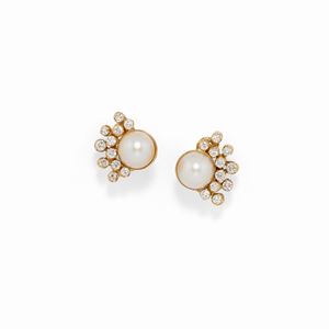  - A 18K yellow gold, diamond and cultured pearl earrings