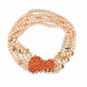 A 18K two-color gold, coral and synthetic stones necklace