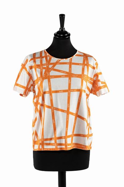 T-shirt in cotone bicolore bianco e arancione con fantasia nastro bolduc