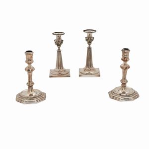 A lot of four silver candle sticks, Italy and Germany, 20th century