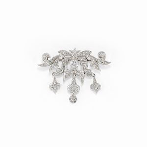 A 18K white gold and diamond brooch, with certificate