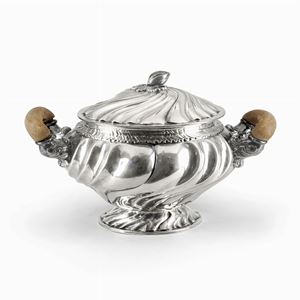  - A silver soup-tureen, with wooden handles, early 20th century
