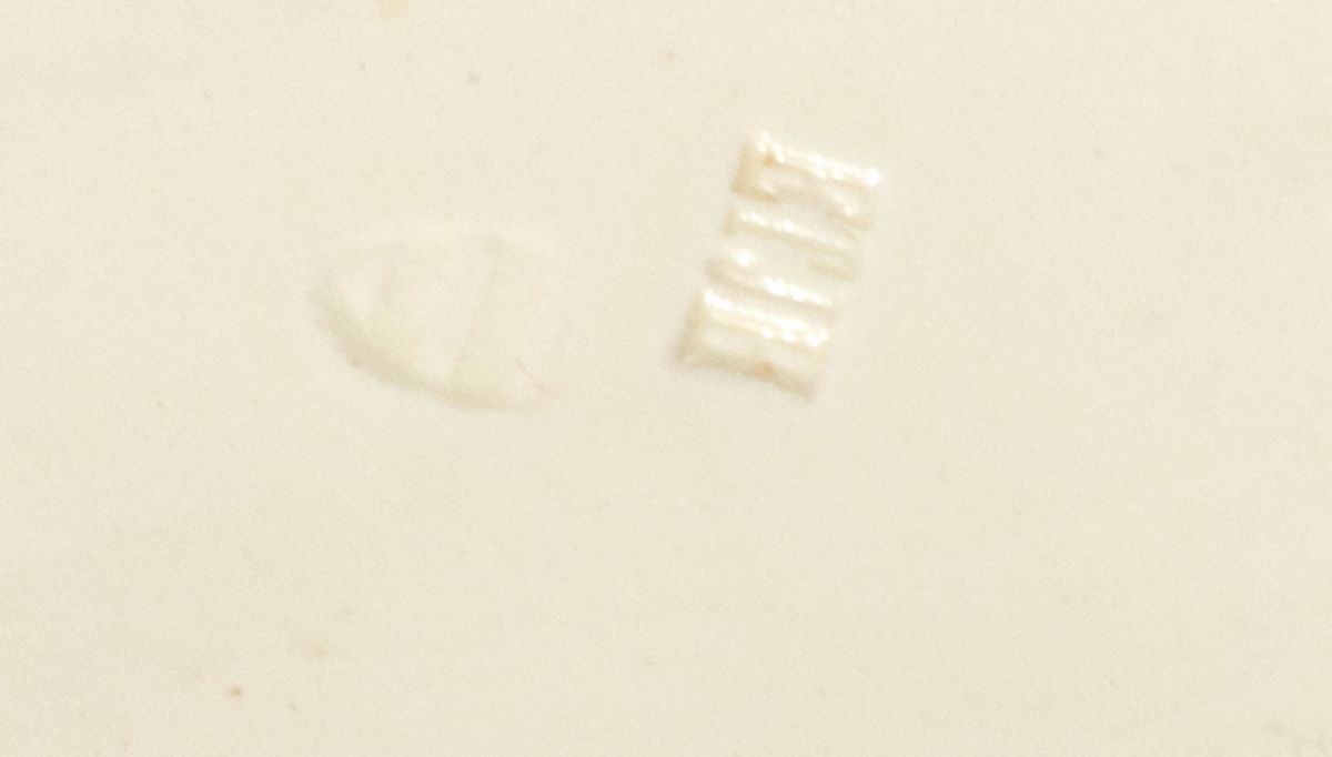 Coppia di vasi biansati con testine di putti e cestino con vassoio, ceramica bianca, secolo XX