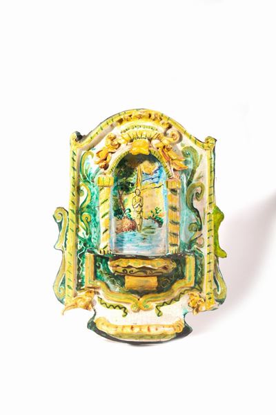 Lotto di tre acquasantiere e due formelle in ceramica policroma, XX secolo