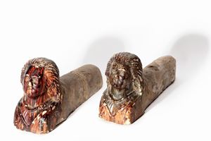 - Pair of ceramic andirons with sphinx busts, 19th century
