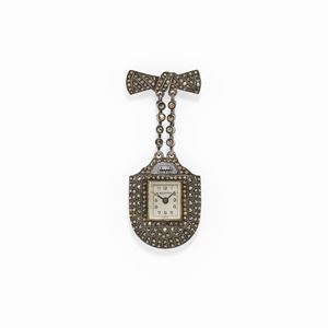 Bucherer - A silver wristwatch-brooch, Bucherer