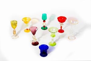 Lot consisting of eight collectible glasses in colored glass