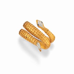  - A 18K yellow gold, silver gilt and diamond bracelet