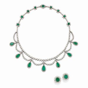 A platinum, 18K white gold, diamond and emerald necklace and earrings