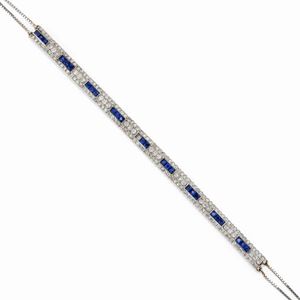 A 18K white gold, sapphire and diamondscollier de chaine