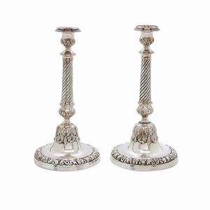 A couple of silver candle sticks, England, 19th century