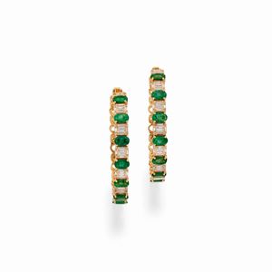  - A 18K yellow gold, emerald and diamond earclips
