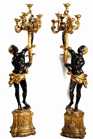 Coppia di mori reggi candelabri, in legno laccato e dorato, fine secolo XIX