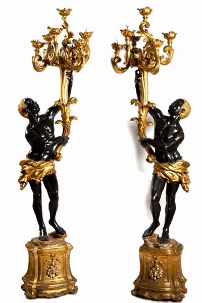 Coppia di mori reggi candelabri, legno laccato e dorato, fine XIX secolo, altezza cm 200