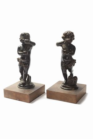 Lot consisting of two small bronze sculptures depicting cherubs, 19th century