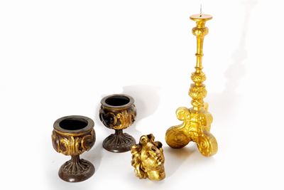 Oggetti in legno intagliato e dorato, XVIII secolo: candelabro, coppie e testina di angelo