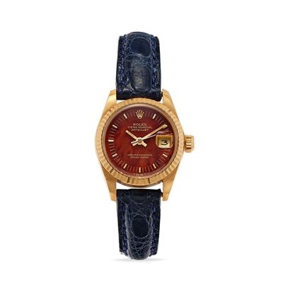 Orologio Datejust 6917, oro 18k con quadrante in radica, anni '70