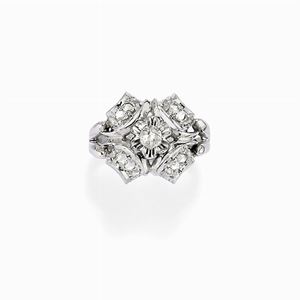 A 18k white gold and diamond ring