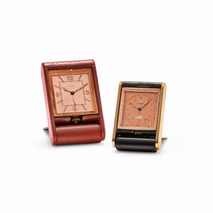 due orologi da viaggio con svegliarino e calendario, anni ‘50