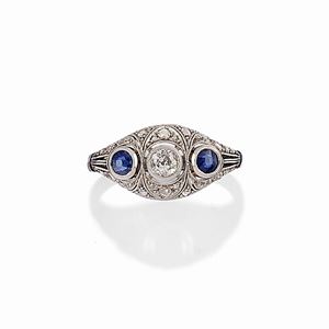 A 18K white gold, sapphire and diamond ring, early 20th Century