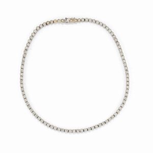 A 18k white gold and diamond tennis necklace, defects