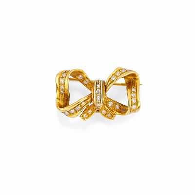 Spilla in oro giallo 18k con diamanti taglio brillante