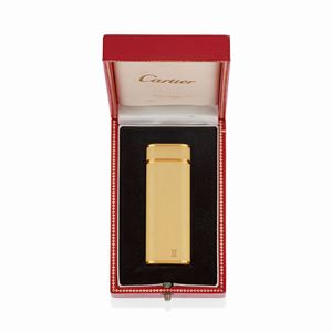 A gold plated and lacquer lighter, Cartier, with box