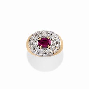  - A 18K yellow gold, ruby and diamond ring