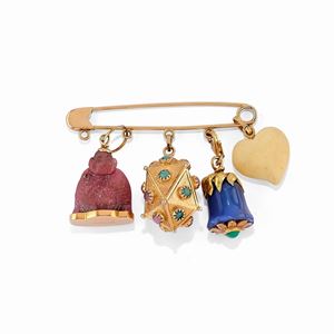 A 18K yellow gold and gemstones brooch with four pendants