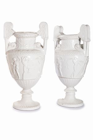 Pair of large white porcelain vases with dancing maenads and handles in the shape of a swan's head, late 19th century