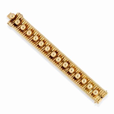 Bracciale tubogas in oro giallo 18K con decori sferici, circa 1950