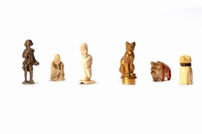 Lotto Composto da Sei Piccole Sculture in Materiali Diversi, Secoli XIX-XX