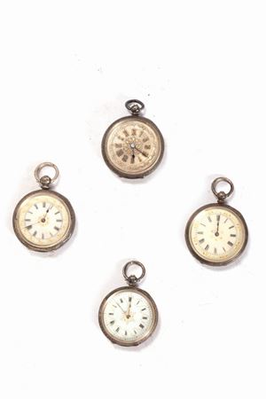Lotto composto da quattro orologi da tasca in argento, secolo XIX