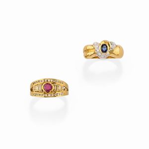 Two 18K two-color gold, ruby, sapphire and diamond rings